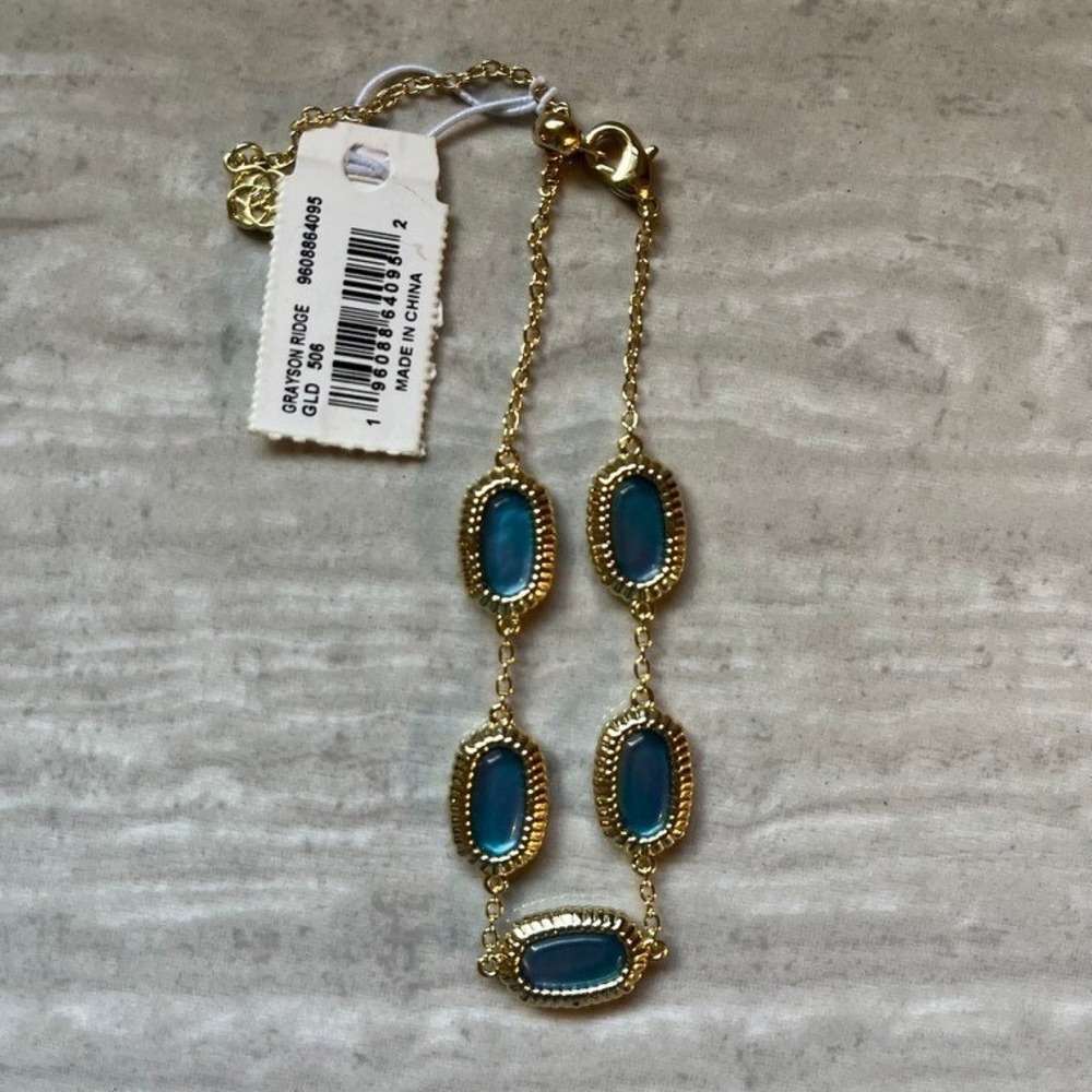 Kendra Scott Gold Tone Teal Blue Stone Lariat Necklace and Slider Bracelet Set - Picture 3 of 7